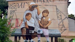 Второе рождение: мурал «Ожидание» вновь украшает стену дома в Алматы
