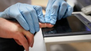 С 1 января у казахстанцев начнут снимать отпечатки пальцев